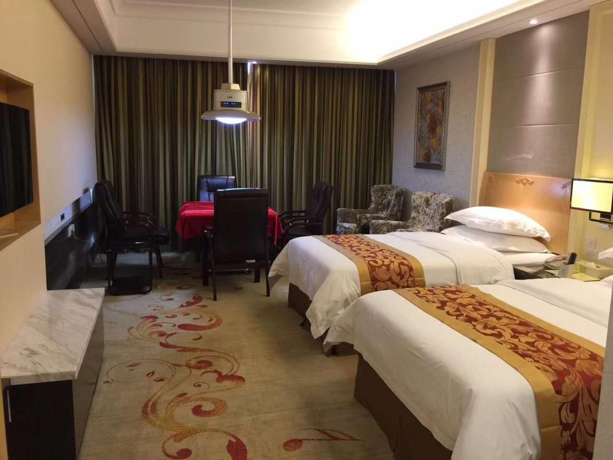 Vienna Hotel Jiangmen Heshan Huamao Exteriör bild